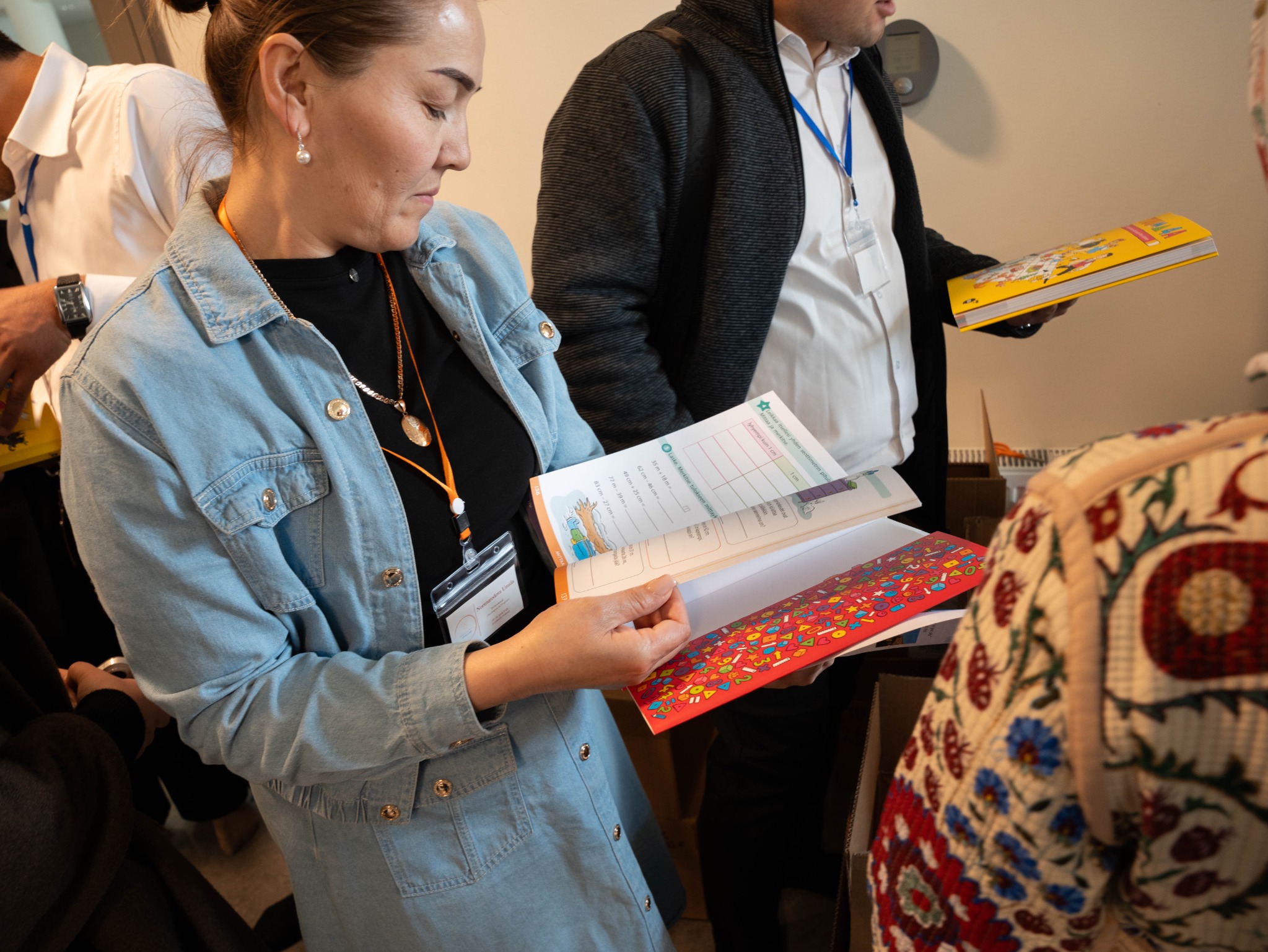 Participant examining practical learning materials