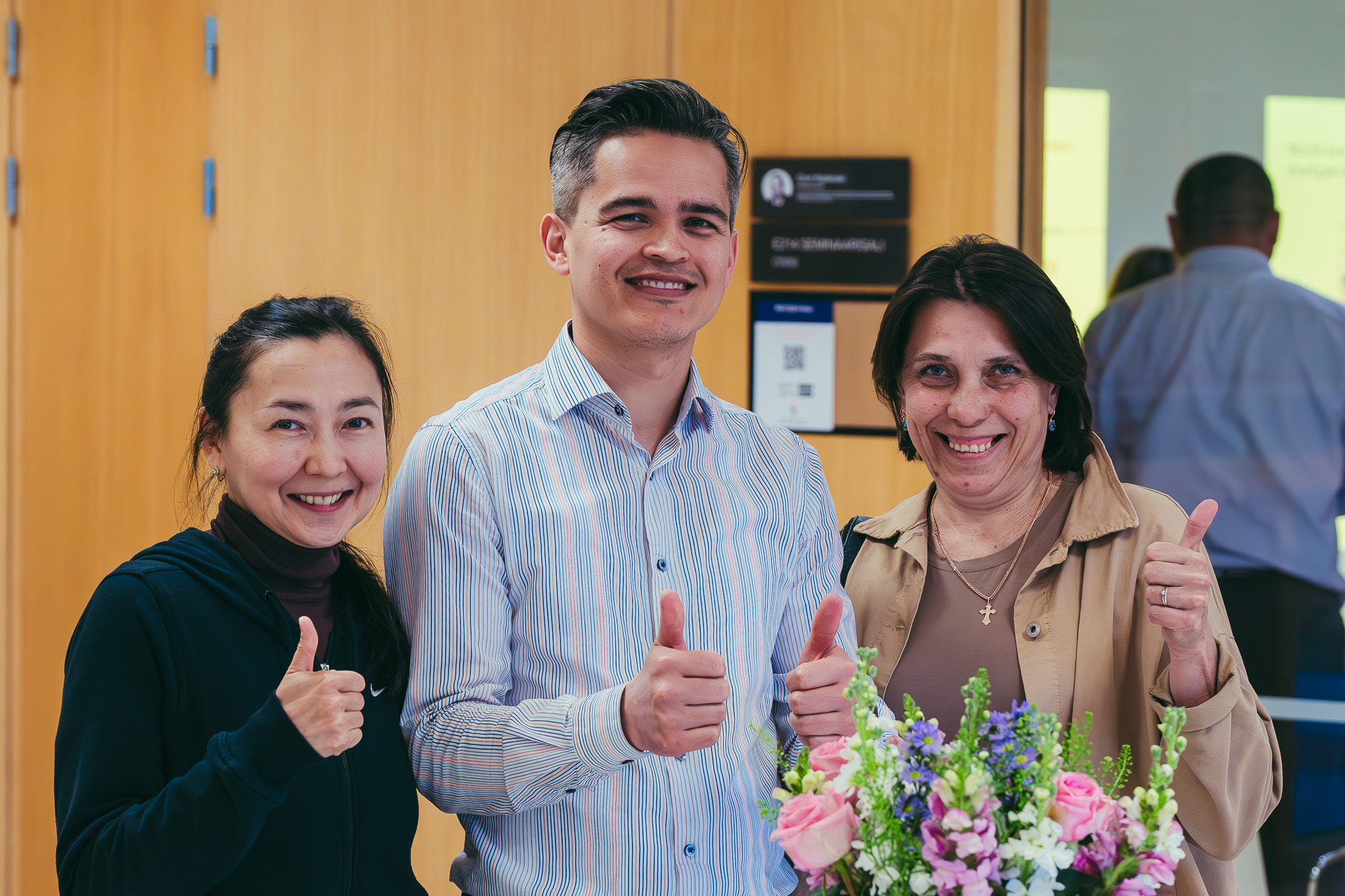 PEDU host and international visitors celebrating their connection